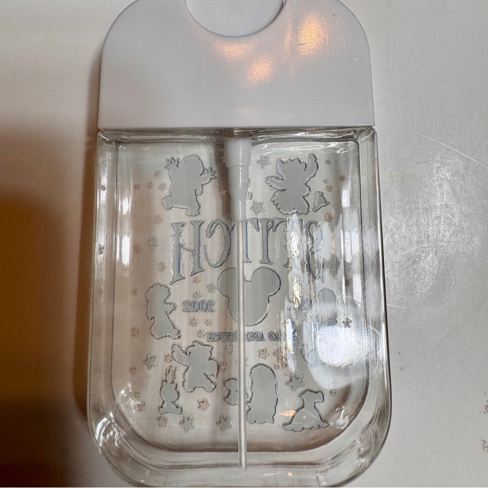 Handmade hand sanitizer spray bottle featuring lilo and Stitch - Picture 6 of 11